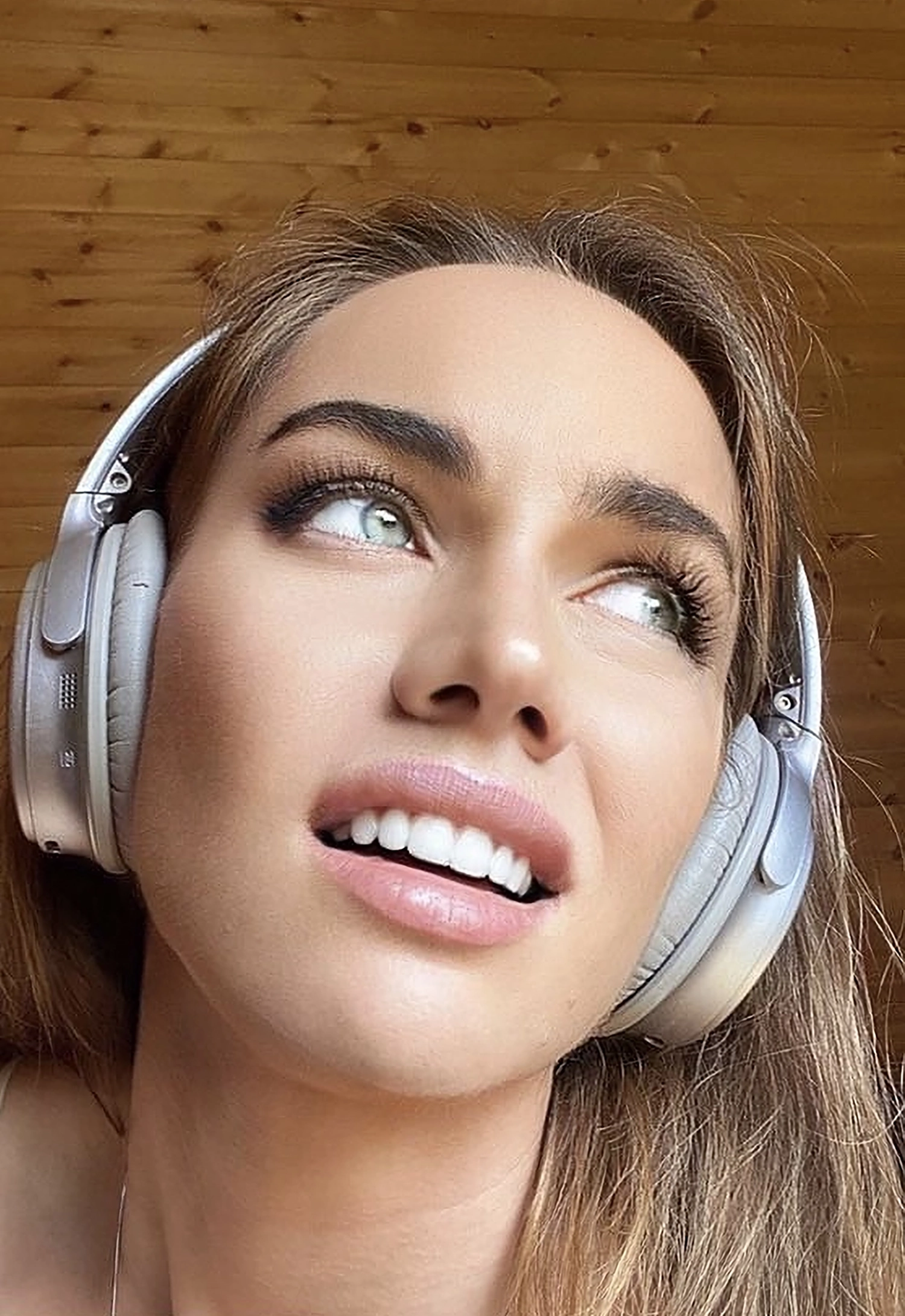 Liv Boeree without and with a beauty filter applied.