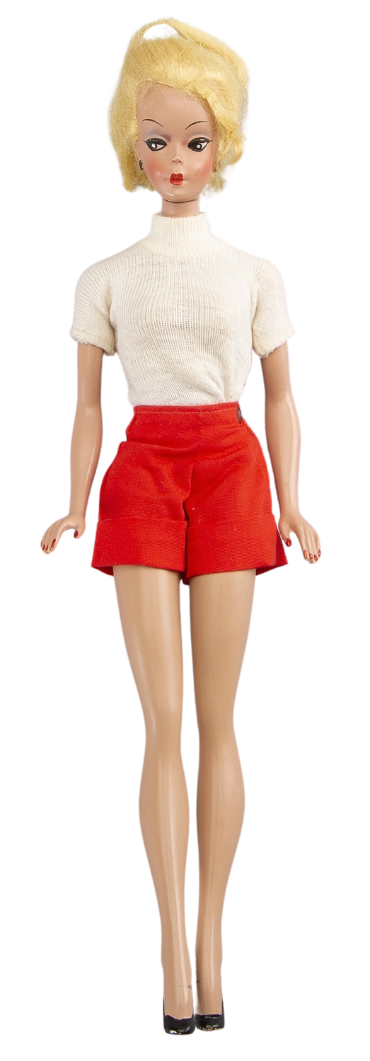 A Bild Lilli doll sporting a blode bob and exaggeratedly long legs. A Bild Lilli doll sporting a blode bob and exaggeratedly long legs.
